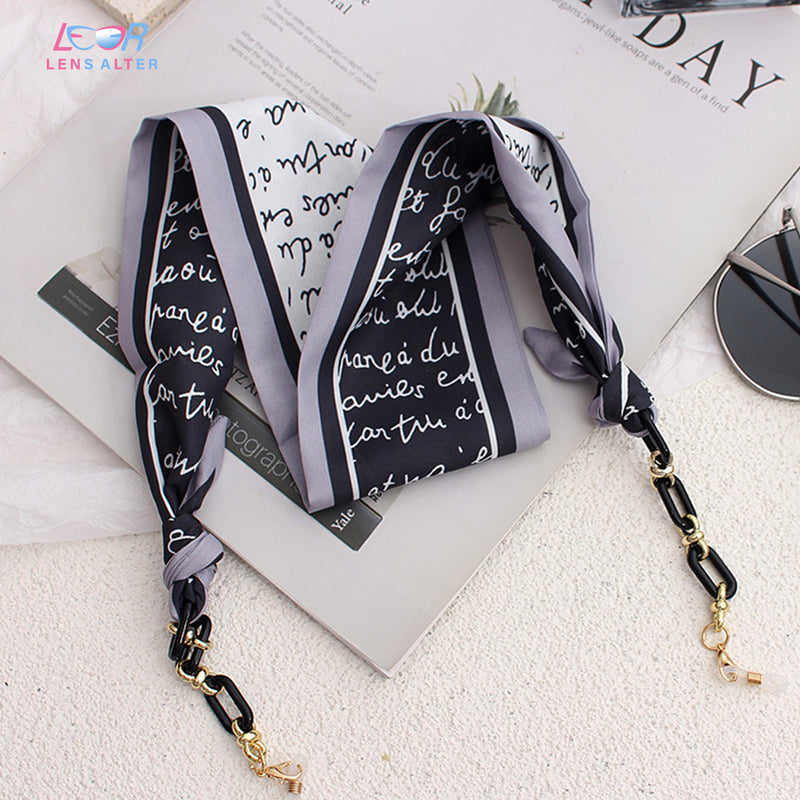 Schwarze Punkte Brillenkette