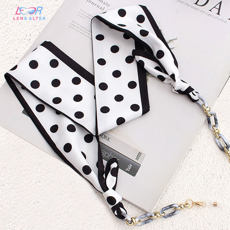 Schwarze Punkte Brillenkette